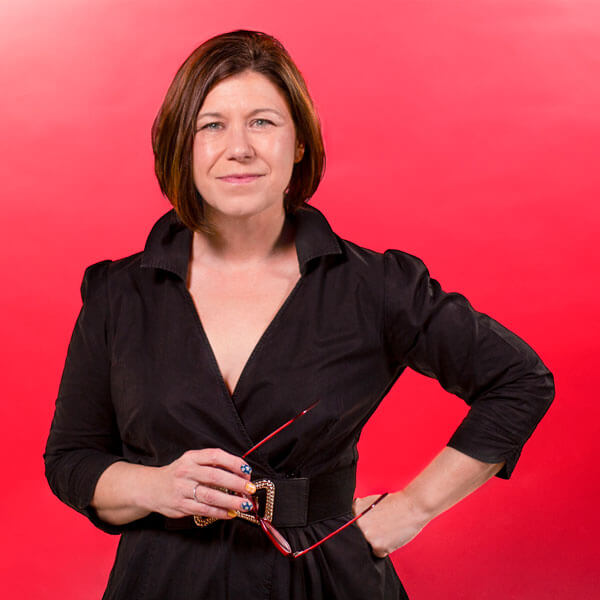 Jen Neumann headshot on red background